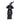 A resin figure of a witch wearing a flowing black robe and a black hat with stars, holding a black cat.
